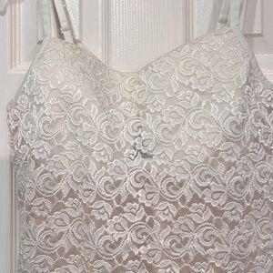 Camisole Beautiful White Lace. Has padded built in bra with fresh color slip.